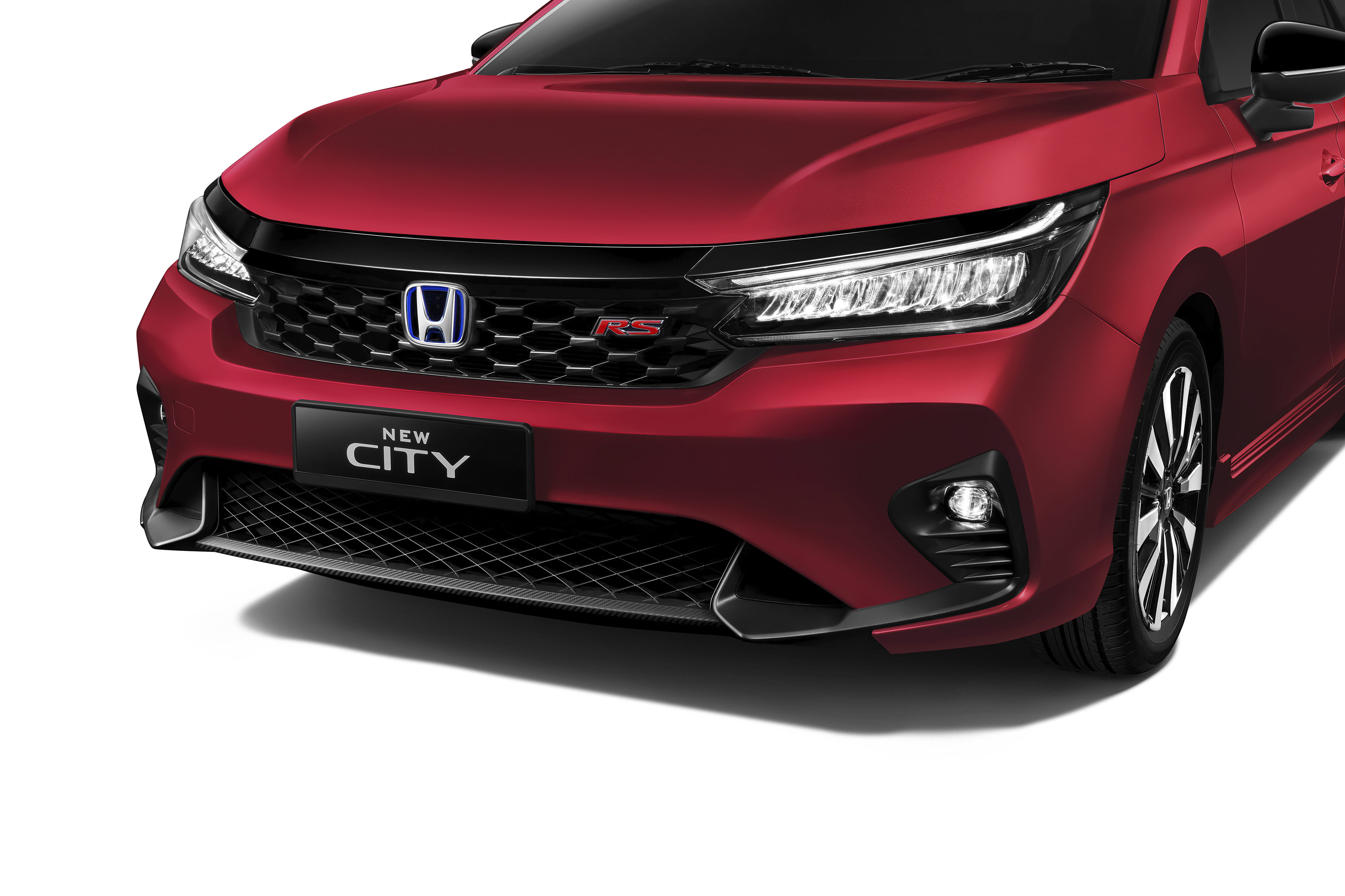 The New City RS’s exterior upgrades include New Honeycomb Front Grille, New Front Lower Grille.
